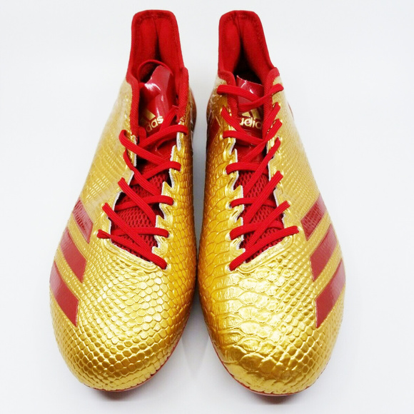 red and gold soccer cleats